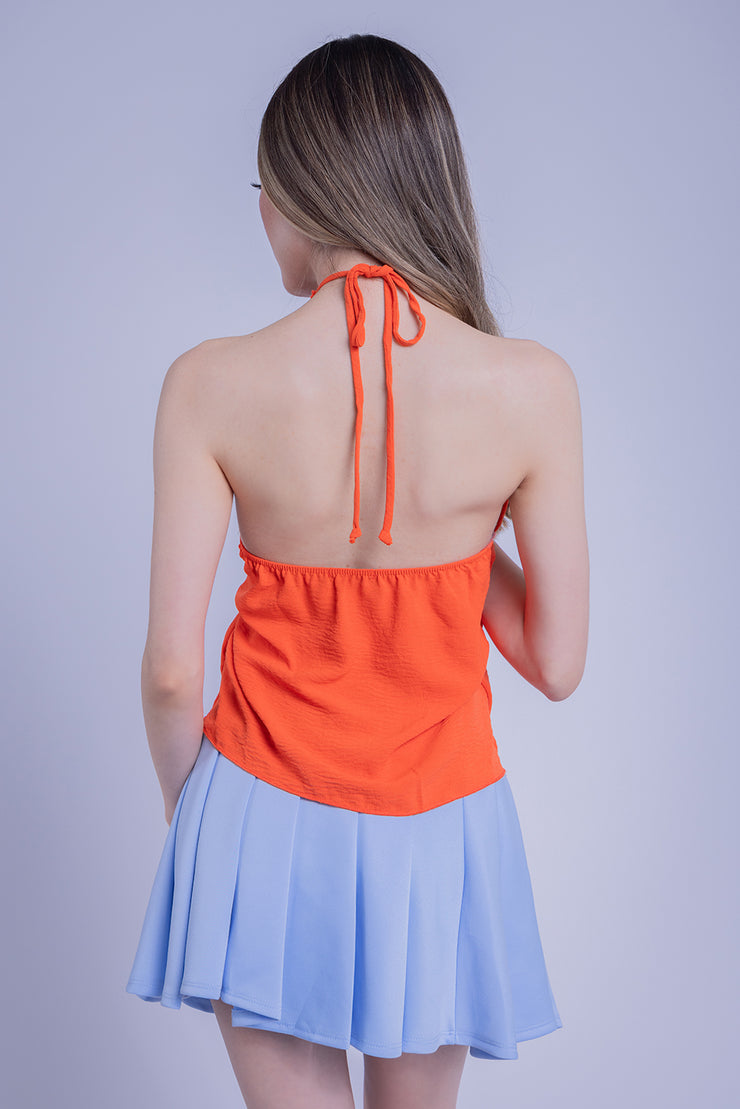 Blusa naranja con detalle en cuello