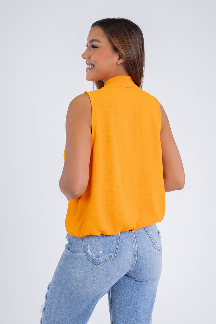 Blusa naranja escote cruzado