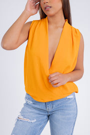 Blusa naranja escote cruzado