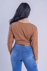 Blusa cruzada con mangas oversize