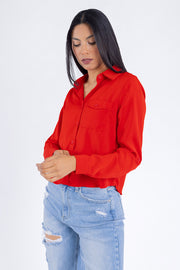 Blusa roja manga larga con bolsita en pecho